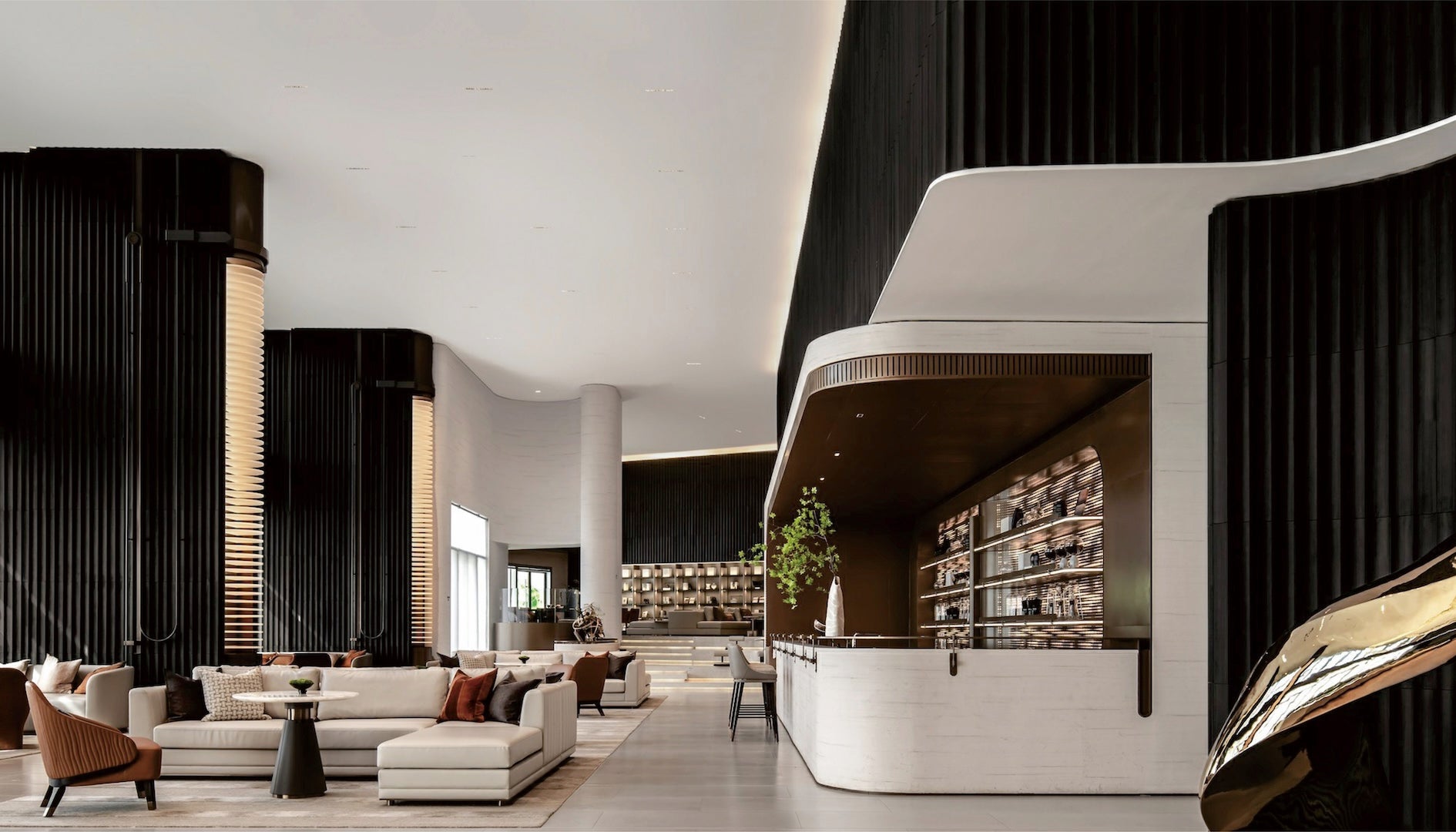 Eleganță în straturi: Amenajarea unui lounge de hotel cu riflaje negre și maro